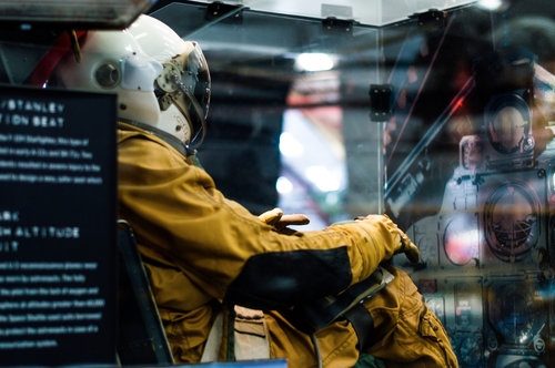 Image of a person sitting in the cockpit of a jetplane